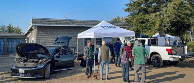 People at a PUD Recharge Event promoting EV buildout and new technology